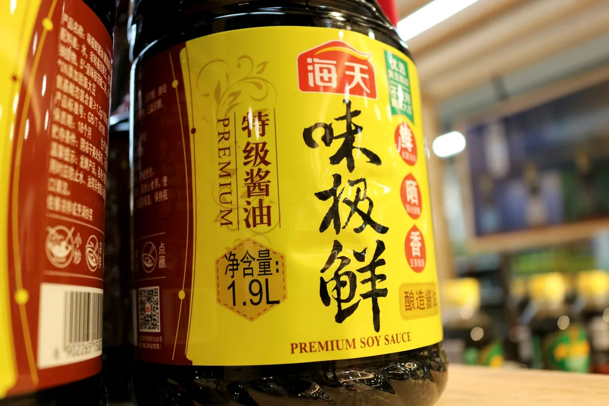 A large bottle of soy sauce on a shop shelf