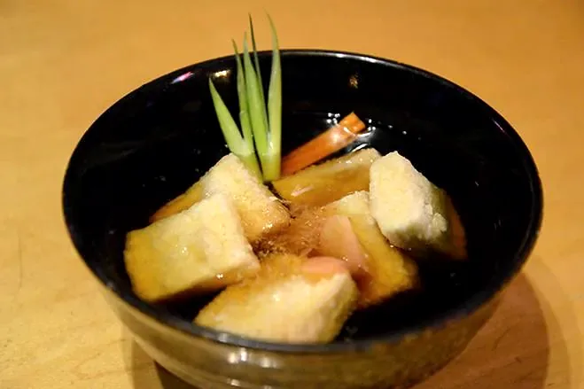 Agedashi Tofu, lightly fried tofu sitting in a warm broth