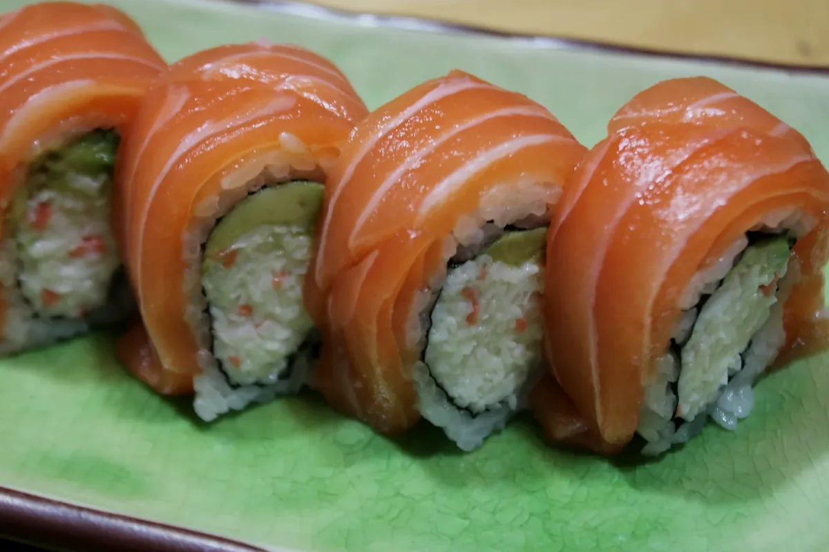 Alaskan roll, a California roll covered with slices of fresh salmon