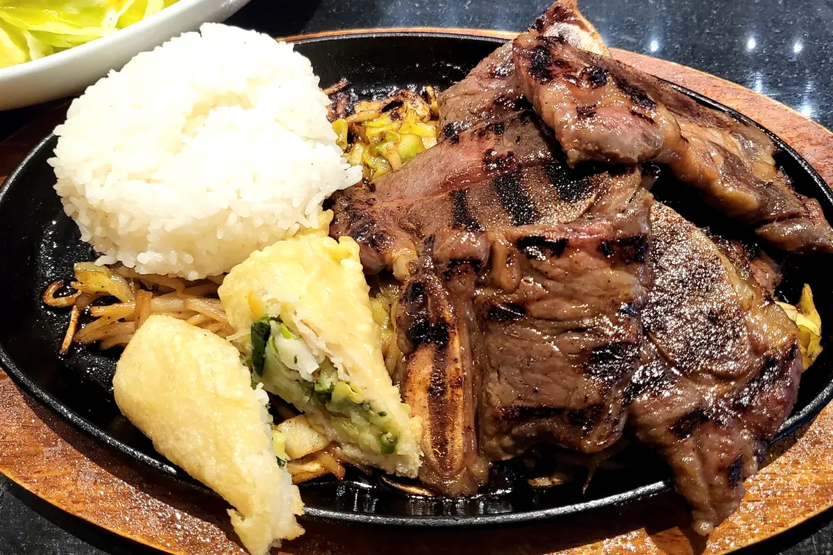 BBQ Short Ribs served with steamed rice, tempura and vegetables