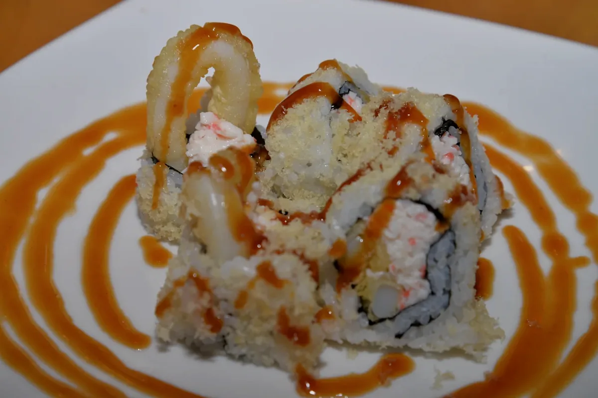 Calamari Tempura Roll made with squid tempura, crab and crunch