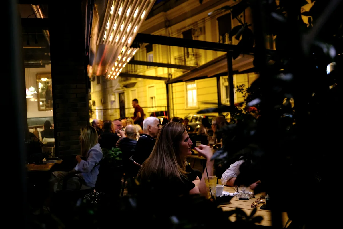 A busy restaurant interior during evening service