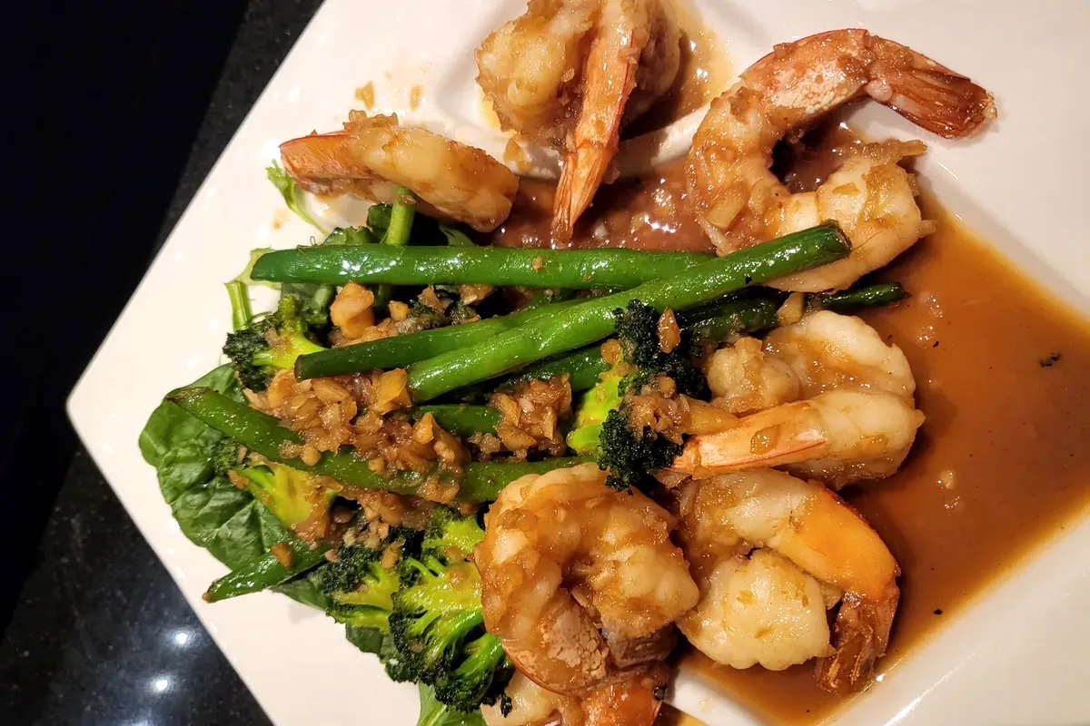 Garlic Shrimp served with asparagus and broccoli in a garlic sauce