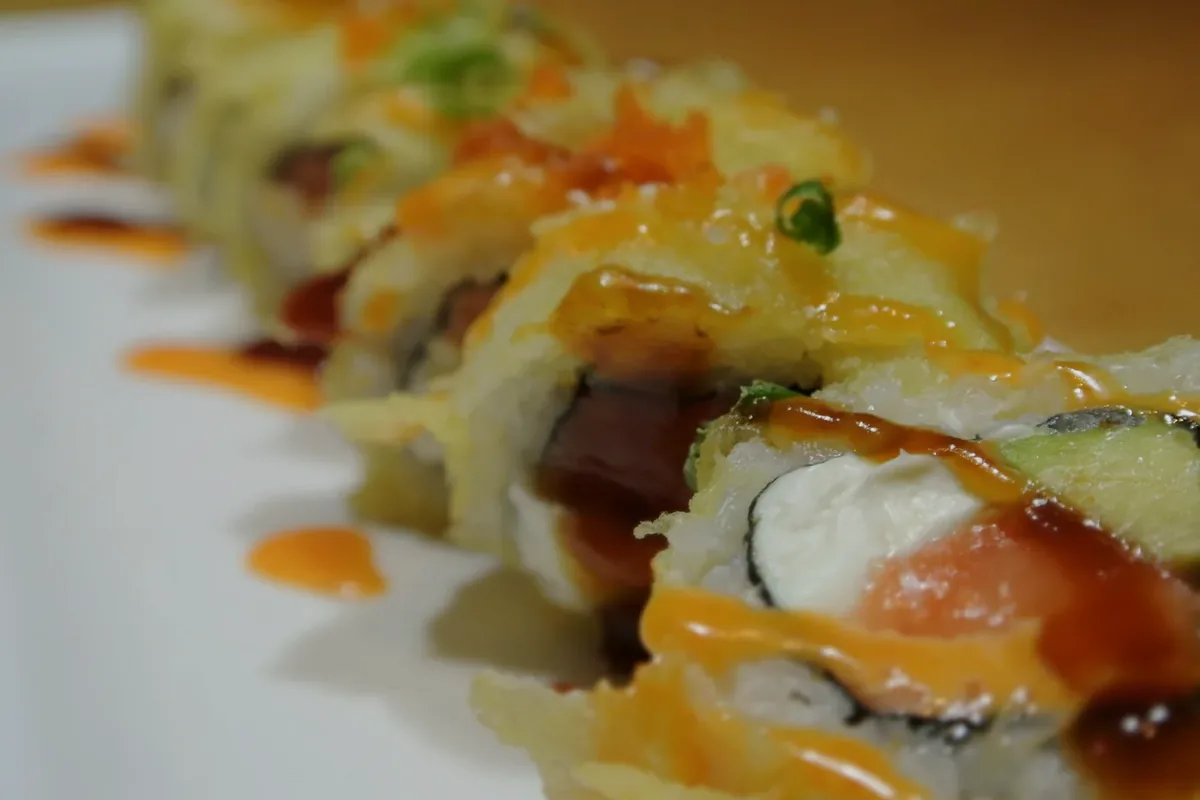 Golden Philadelphia, a deep fried roll of salmon, cream cheese and avocado