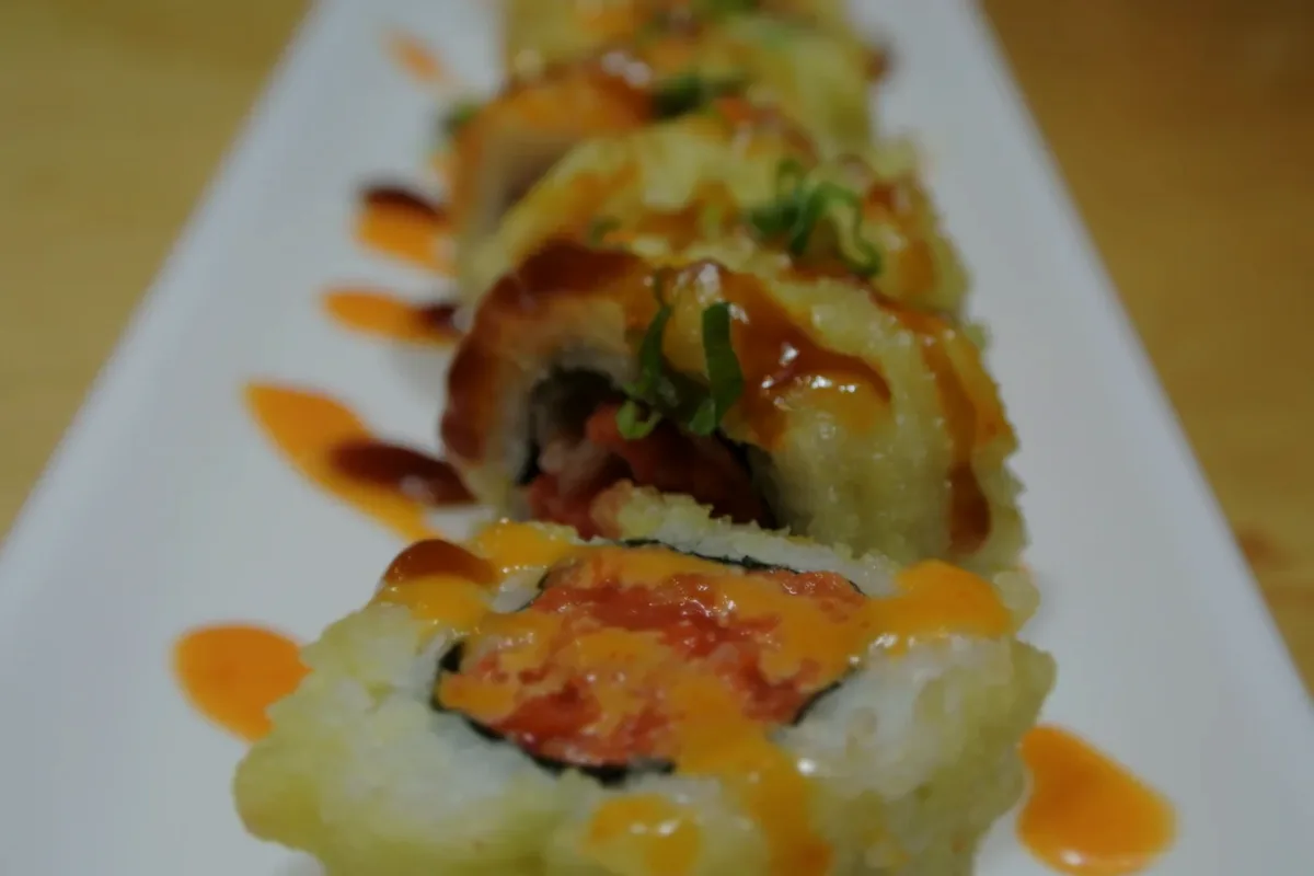 Golden Spicy Tuna, a spicy tuna roll deep fried whole and sliced