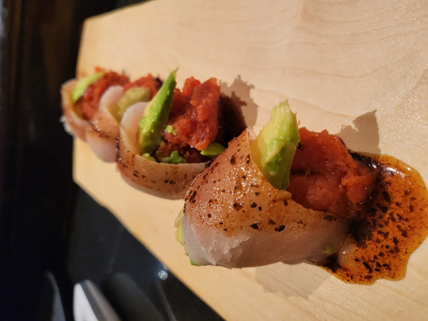 Albacore Lover - spicy tuna and avocado wrapped in albacore, made without rice