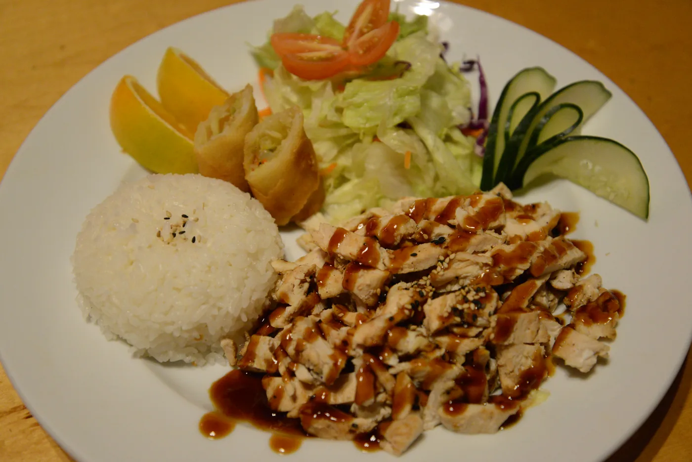 Chicken Teriyaki Plate - sliced glazed chicken with rice and salad