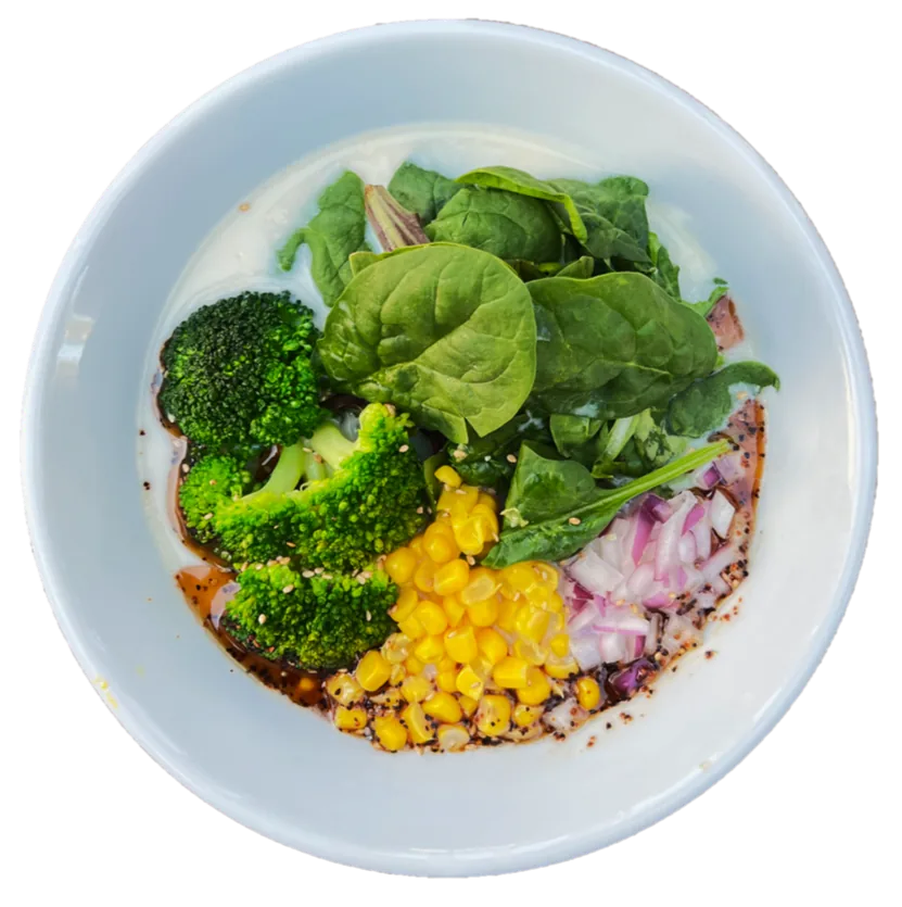 Creamy Vegan ramen with broccoli, corn, red onion and greens
