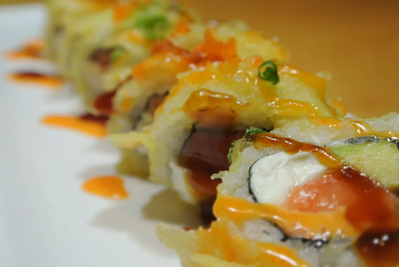 Golden Philadelphia - deep fried salmon, cream cheese and avocado