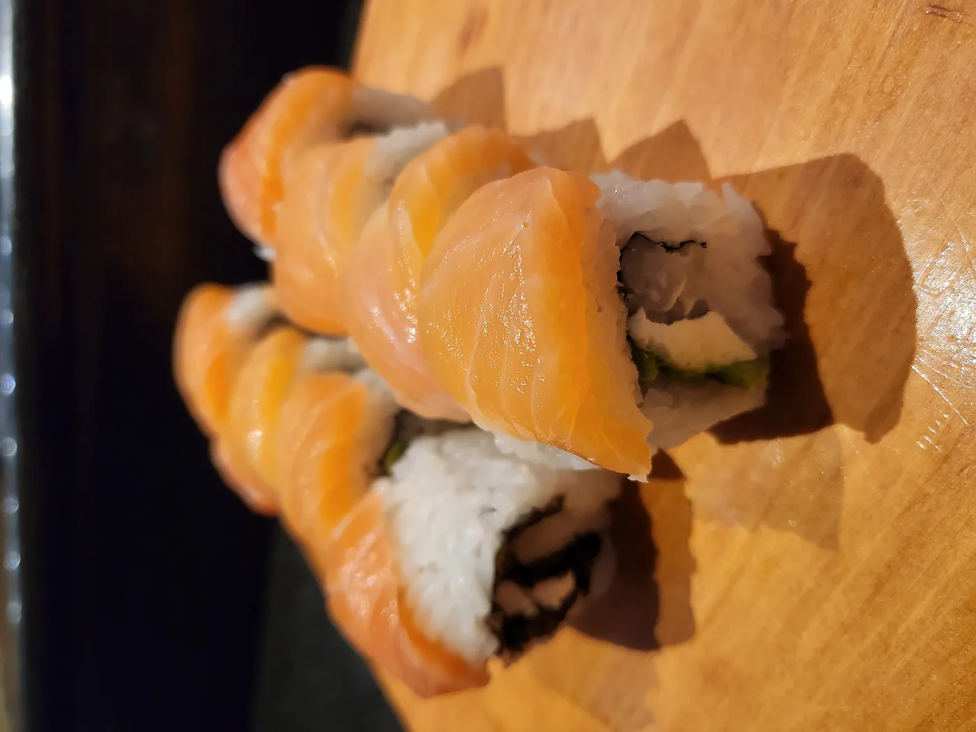 New Philly roll - cream cheese and avocado with salmon laid on top